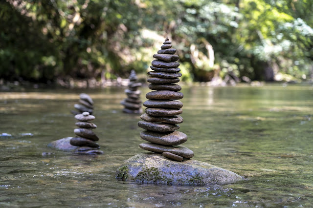 majestic shot many stone pyramids balanced river water
