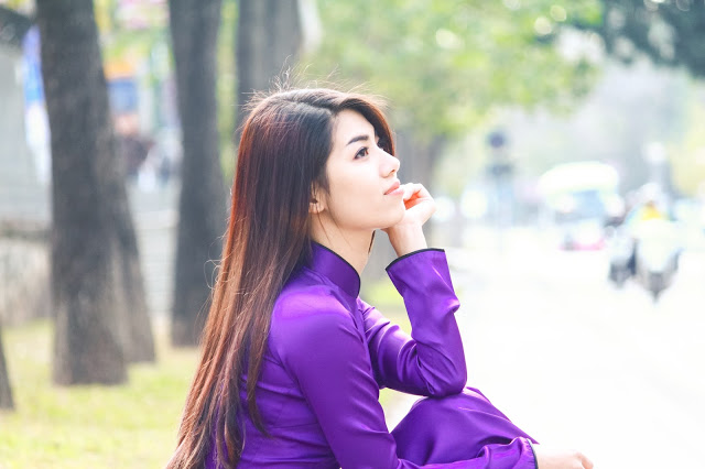 hinh anh co gai mac ao dai tim hue that dep 